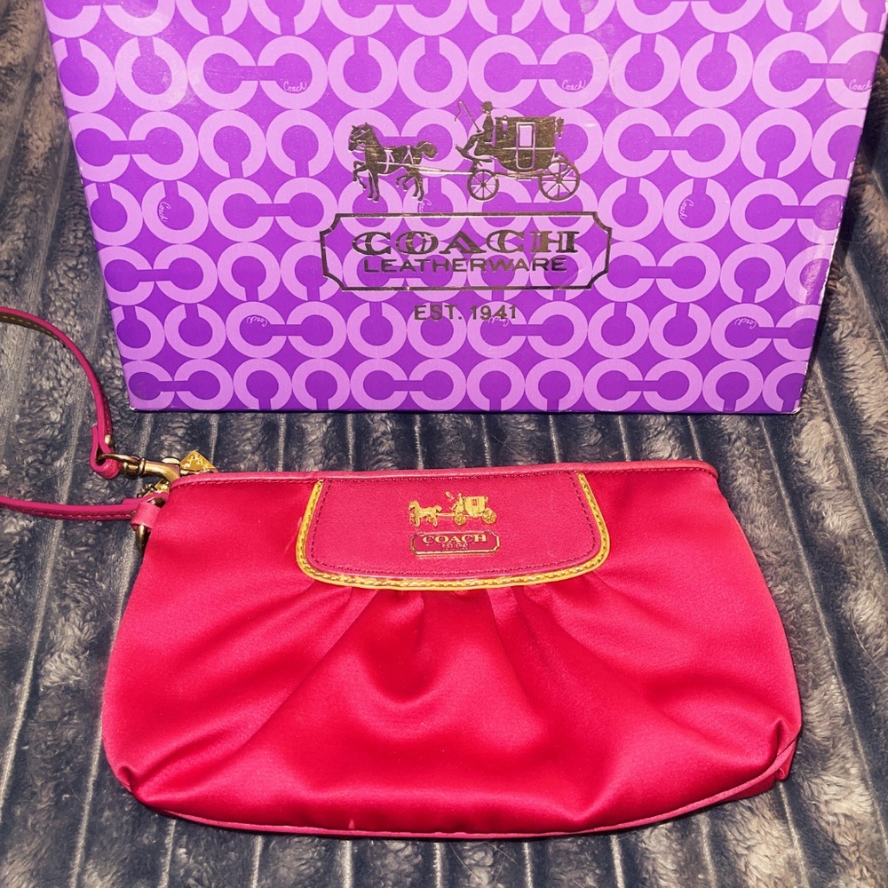 Hot pink Coach wristlet